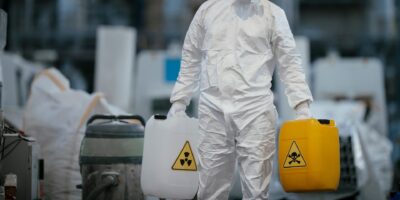 man transporting toxic chemicals